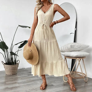 Beige klänning med volang