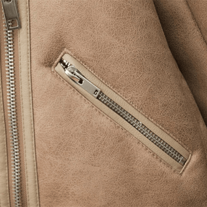 Beige shearlingjacka