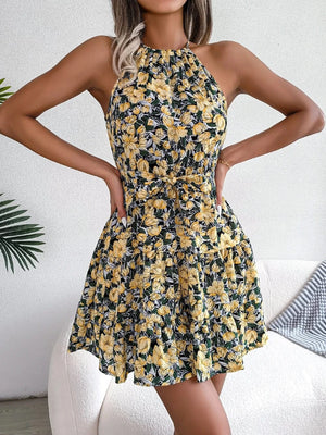 Blommig klänning halterneck