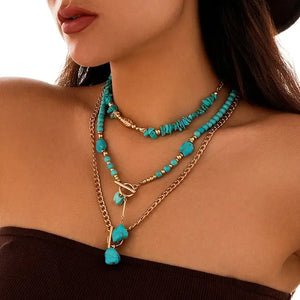 Boho halsband med western-berlocker