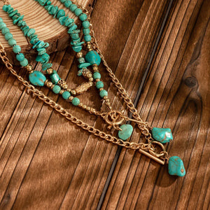 Boho halsband med western-berlocker