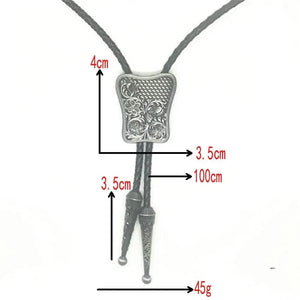 Bolo tie i rektangulär mörk metall med blommigt vintagemönster Mörkgrå