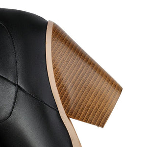 Fransiga Cowboyboots i Glansig Läderlook med Kilklack