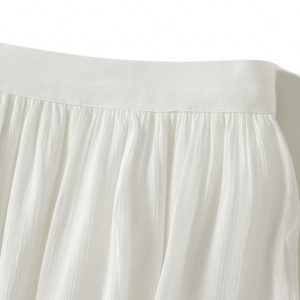 Midikjol med asymmetrisk drapering