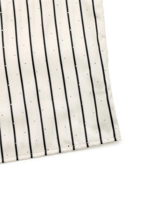 Randig blus med volang