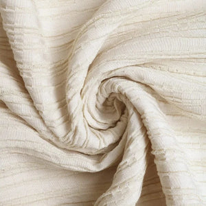 Beige klänning med volang