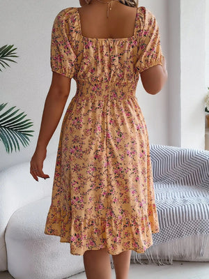 Blommig off-shoulder midiklänning