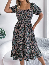 Blommig off-shoulder midiklänning Svart / S