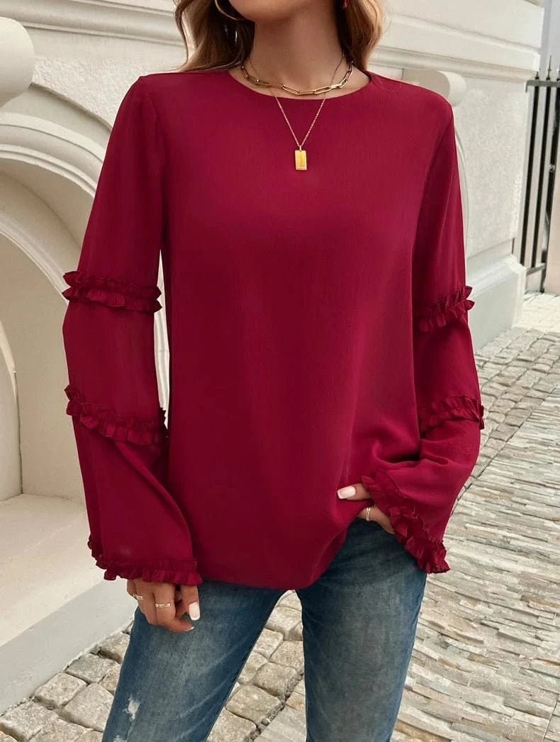 Blus med trumpetärm