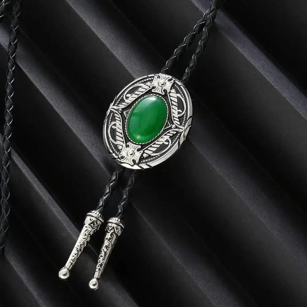 Bolo tie med oval sten och vågformad ram