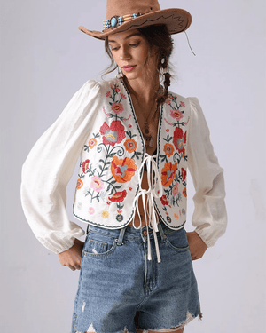 Broderad blus med blommor