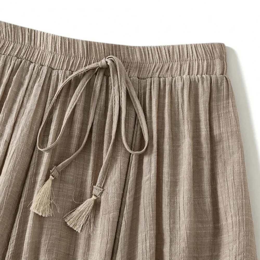 Långkjol i linne med dragsko