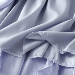 Midikjol med asymmetrisk drapering