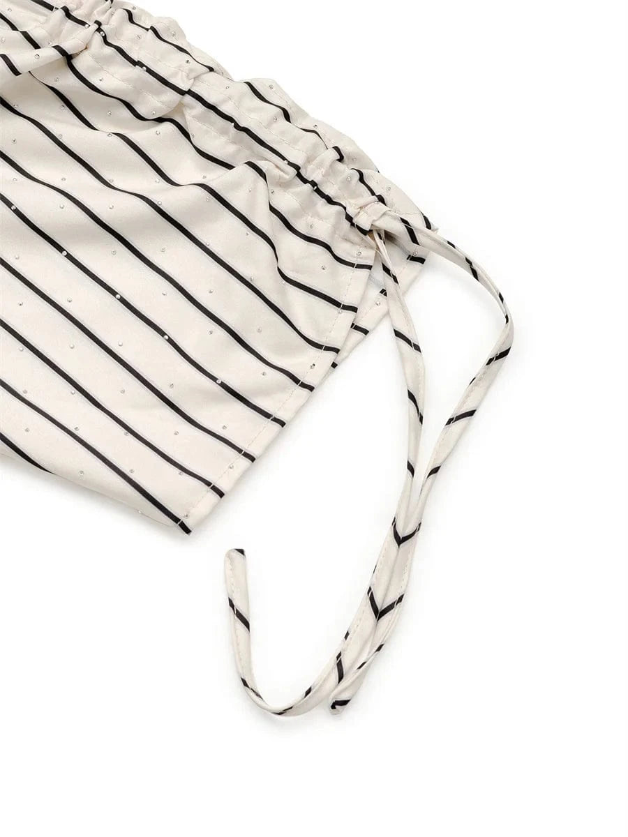 Randig blus med volang