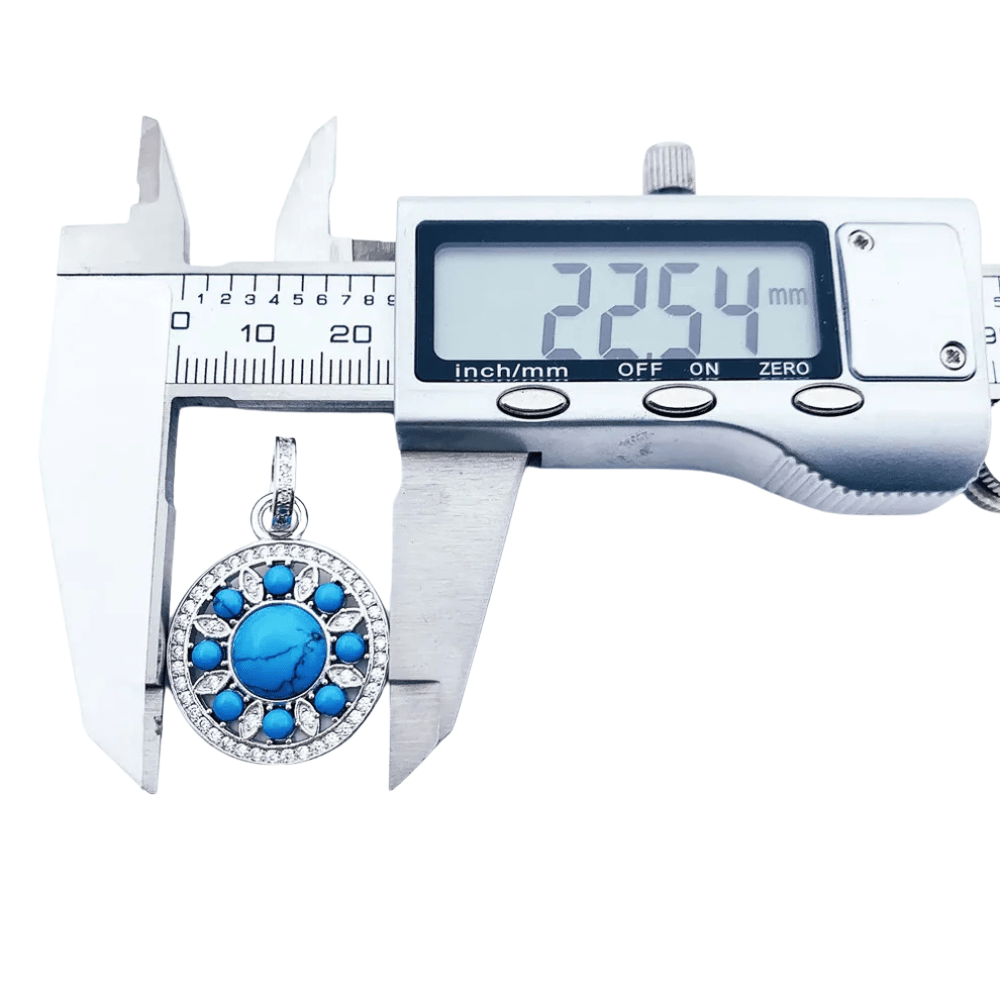 Rund silverberlock med turkos och strass Silver med turkos