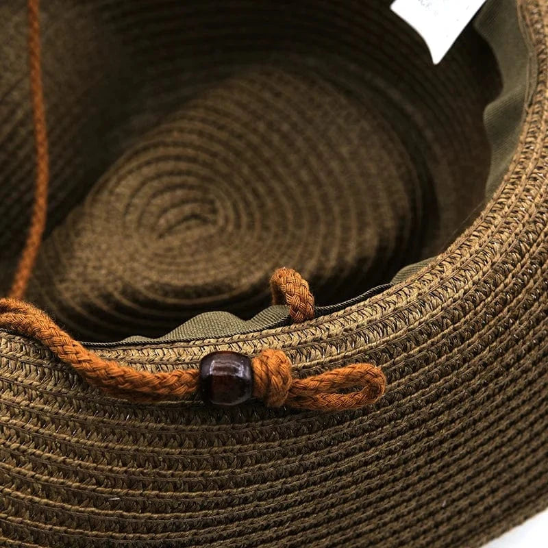 Stråcowboyhatt med fjäderdekor