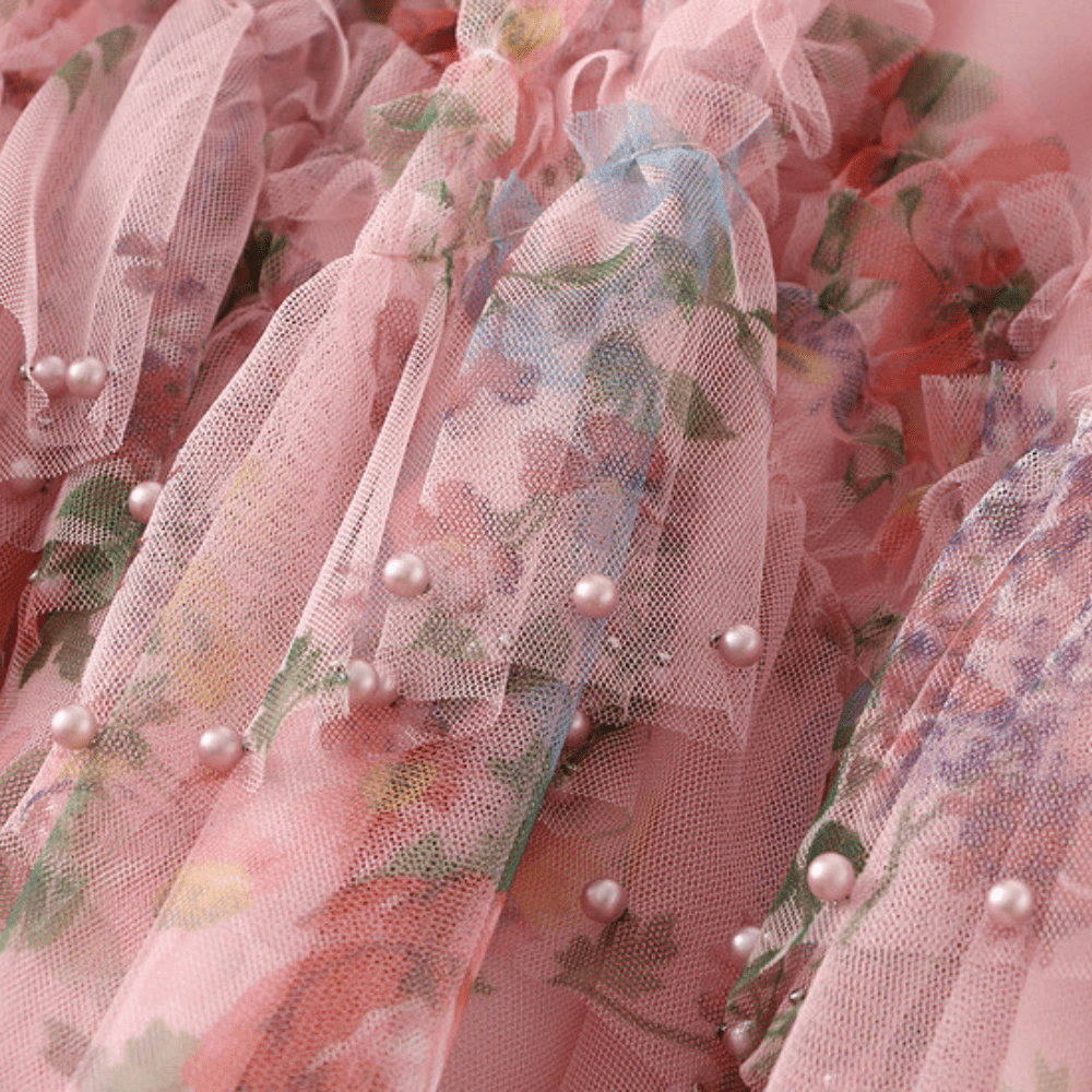 Tyllkjol med blomstermotiv