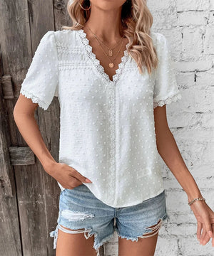 V ringad blus dam